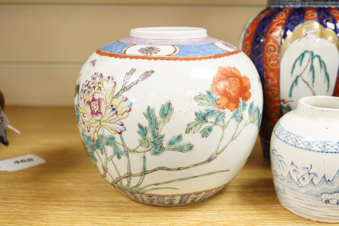 An Imari vase and cover-28cm high, a Chinese jar and prunus vase and a small blue and white jar.